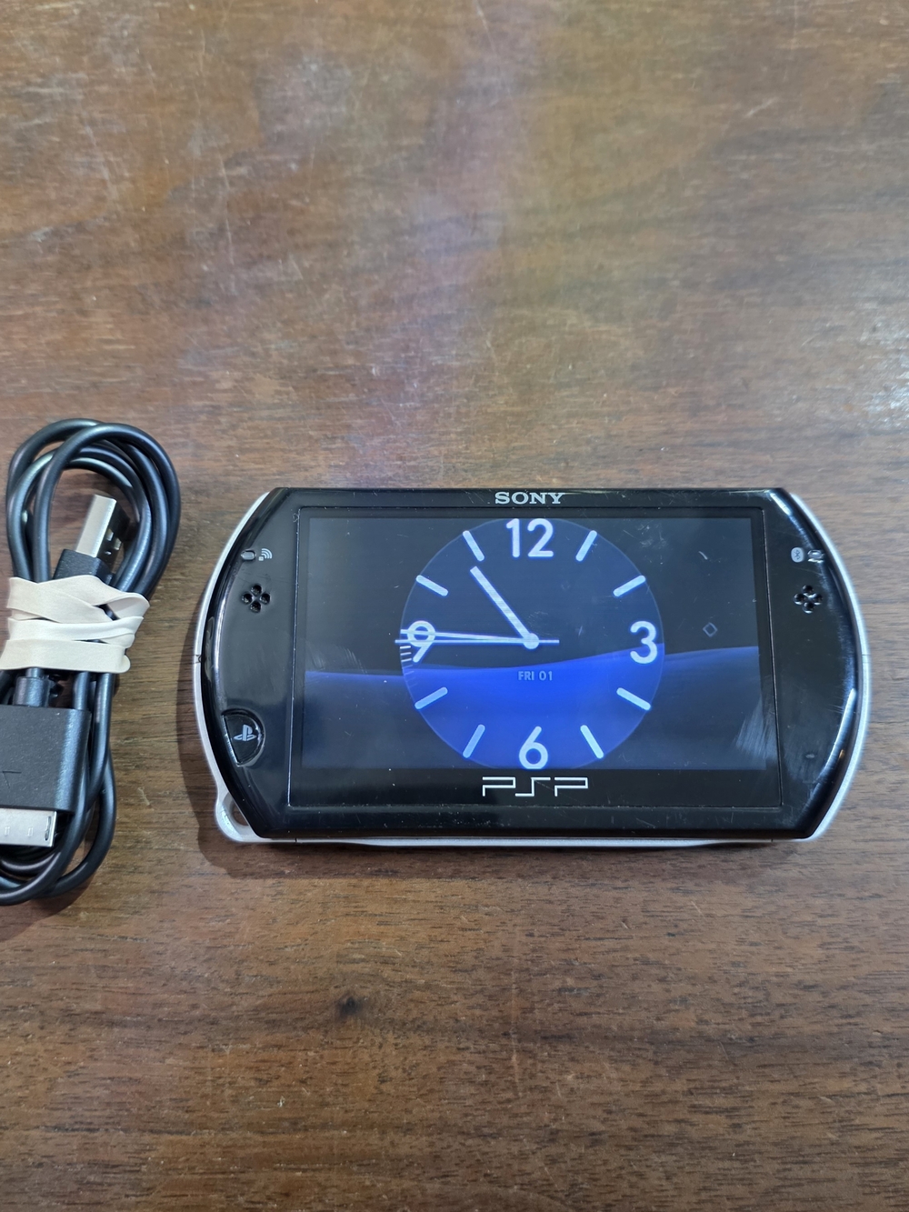 Rare Sony PSP Go Piano Black 16 GB handheld console